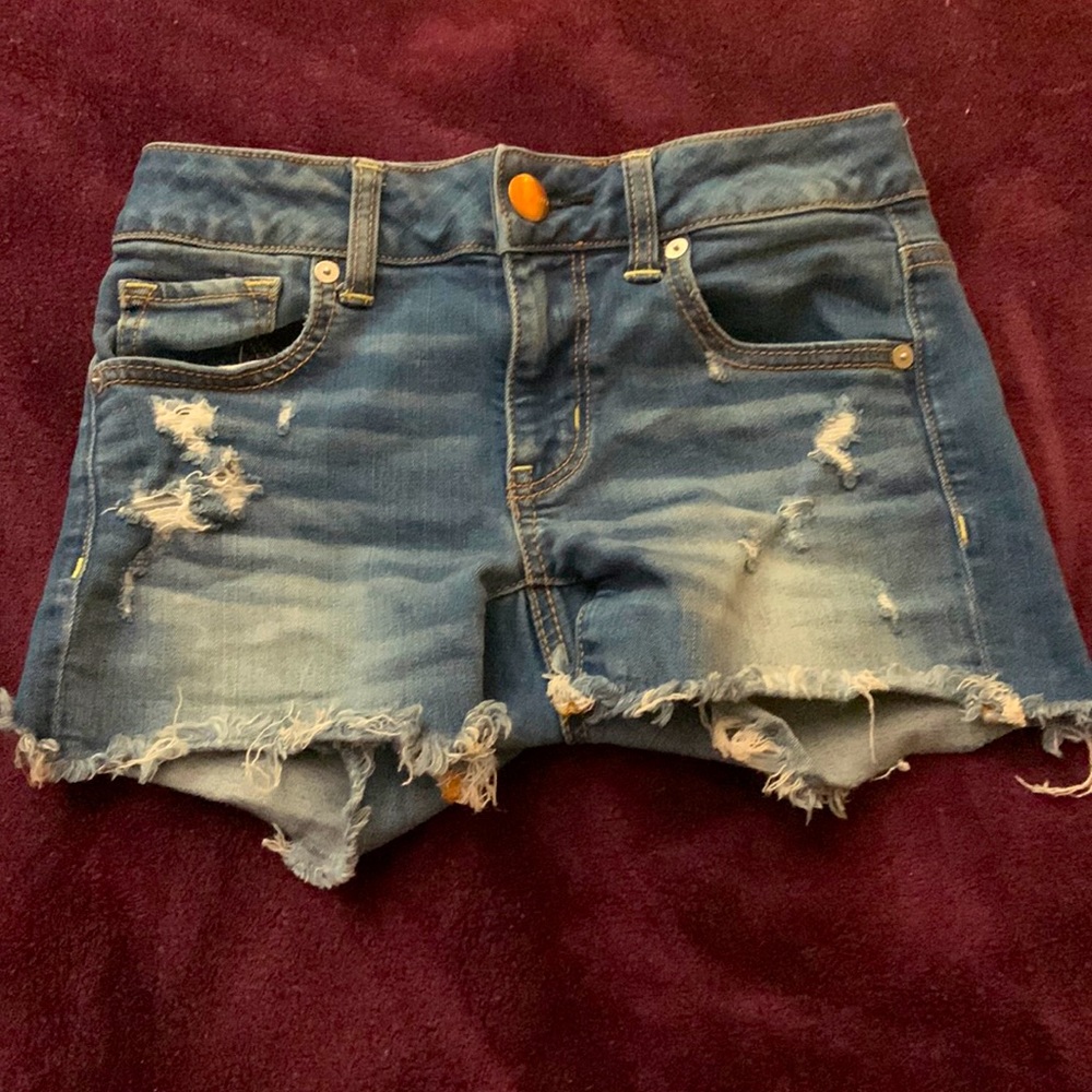 American eagle ripped blue jean shorts